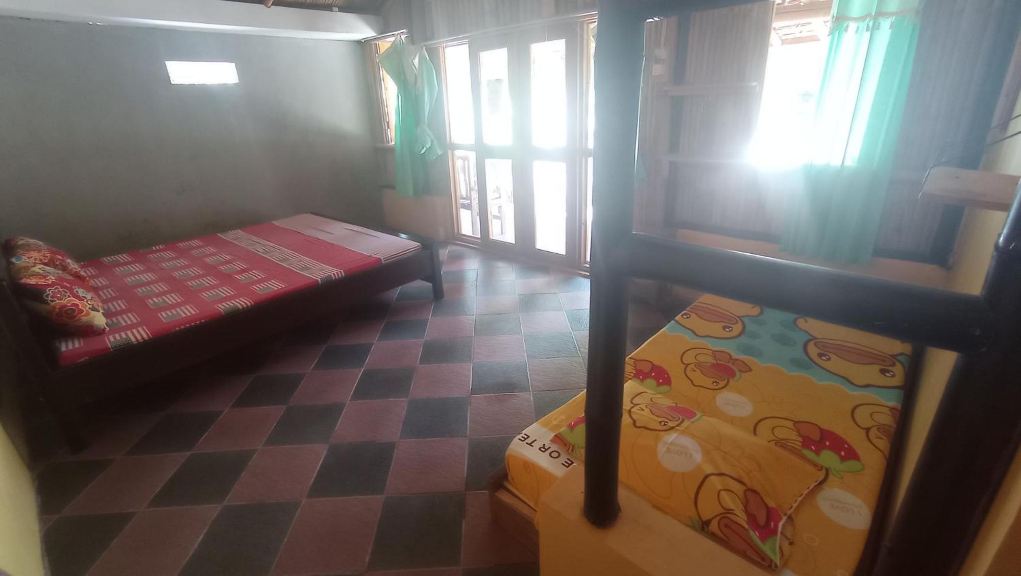 Kalak Harry'S Ocean House Watukarung Homestay חדר תמונה